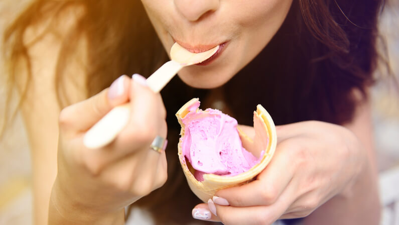 lady eating ice cream in a cone