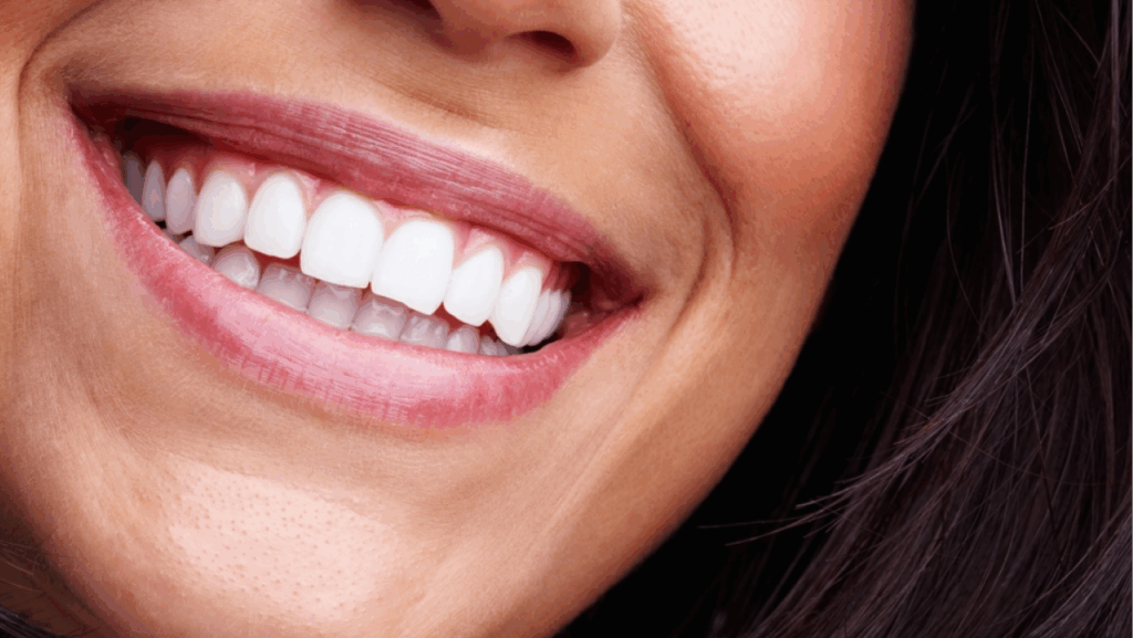 Dental, smile and teeth of woman with hygiene, grooming and wellness morning routine for oral care. Happy, dentistry and female person with mouth treatment for fresh breath, health and gum cleaning.